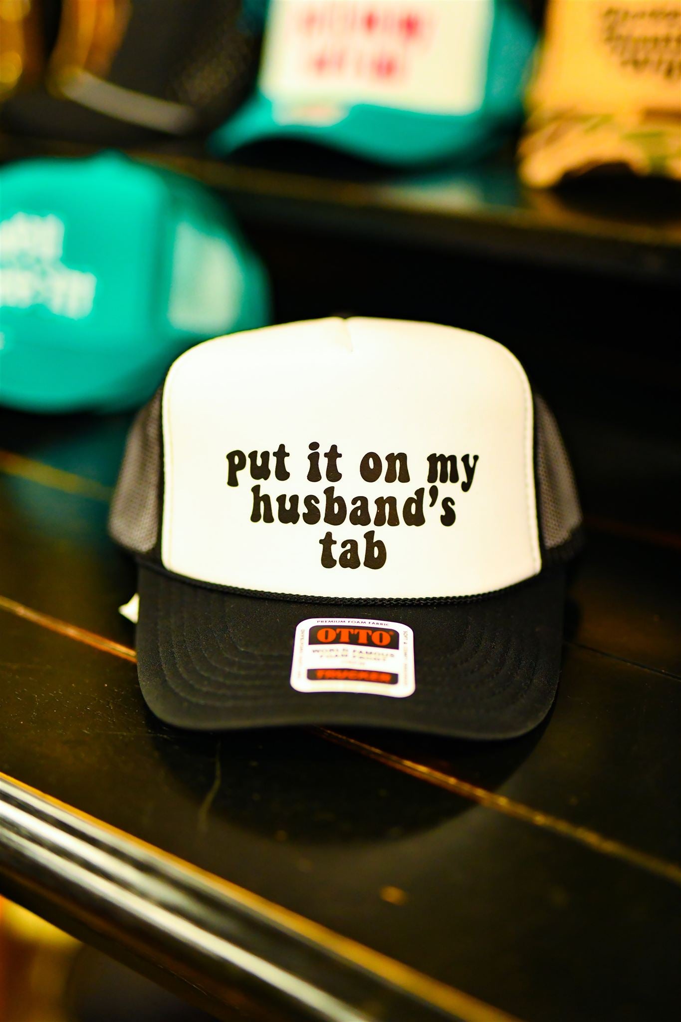 Put it on my husbands tab cap